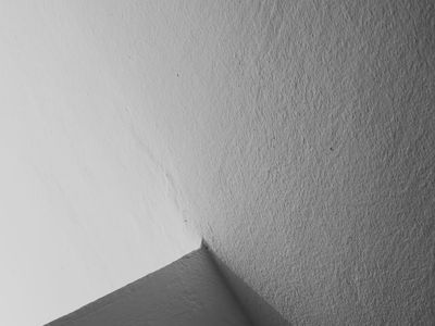 Abstract shadows on a white wall in gym