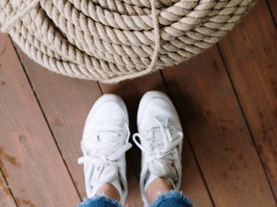 Close up of sneakers on a wooden floor